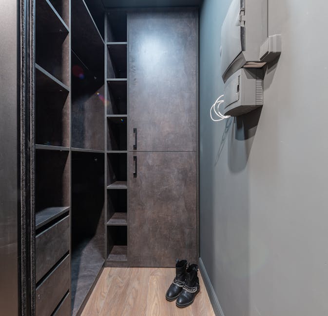 Organized shoe closet shelves with ambient lighting